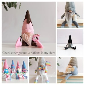 May include: A collection of handmade felt gnomes in various colors and poses. The gnomes are wearing hats and have long white beards. Some gnomes are holding accessories like a donut, a cup, and a rainbow flag. Check other gnome variations in my store.