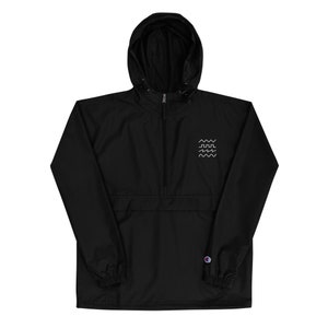 May include: Black hooded windbreaker jacket with a zipper closure and a small embroidered logo on the chest. The logo is a series of wavy lines.