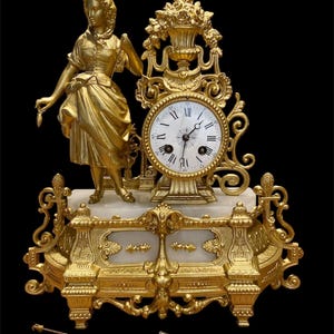 Antike Kaminuhr, spätes 19./frühes 20. Jahrhundert, vergoldete Bronzeskulptur