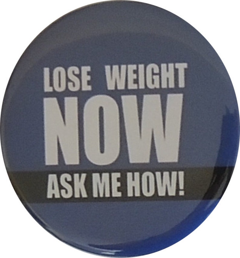 May include: A blue round button with white text that reads "Lose Weight Now Ask Me How!"