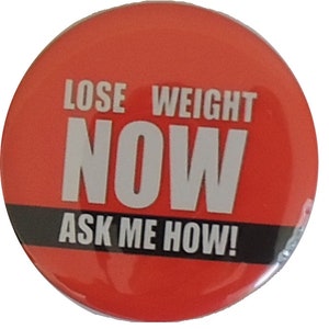 May include: Red button with white text that reads "Lose Weight Now Ask Me How!"