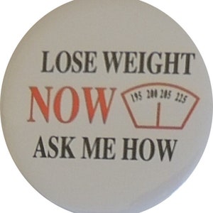May include: White button with black text that reads "Lose Weight Now Ask Me How". A red scale graphic with numbers 195, 200, 205, and 225 is next to the word "Now".