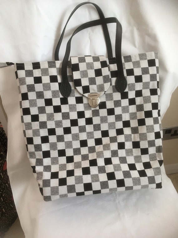 black and cream handbag