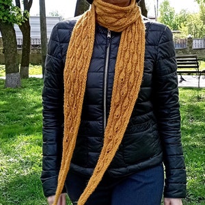 The scarf made of angora is warm, soft, delicate, elegant