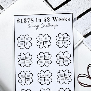 May include: A black and white printable savings challenge chart with the text "$1378 In 52 Weeks Savings Challenge". The chart is divided into 13 sections, each with a four-leaf clover design. Each clover has four numbers representing weekly savings amounts, starting with $1 and ending with $52.