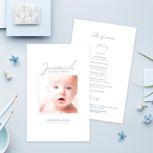 May include: A white memorial service order of service with blue text. The order of service includes a prelude, processional, prayer and welcome, scripture reading, personal tribute, deep the father's love, and concluding prayer. The order of service also includes a photo of a baby boy with the name Jeremiah Nathaniel Proffitt and the dates 10.00.00-11.15.00.
