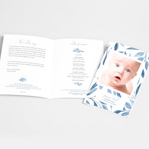 May include: A blue and white memorial service program with a photo of a baby boy. The program includes the order of service and a message that reads "Forever Loved Aaden Sage 10.08.2018 - 11.23.2018".