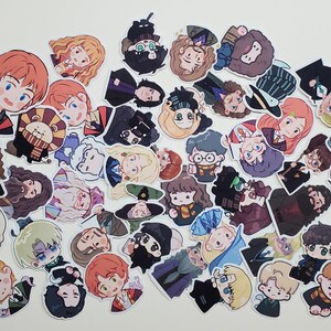 May include: A collection of colorful stickers featuring cartoon illustrations of characters from a popular fantasy series. The stickers depict various characters with distinct facial features and attire, set against a white background.