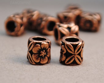 10 small crossed flower  hair / beard beads