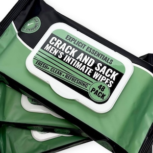 May include: Three packs of intimate wipes. The packaging is black and green with a white label. The label reads "Explicit Essentials Crack and Sack Men's Intimate Wipes" with "Fresh Clean Refreshing" below. The pack contains 48 wipes.