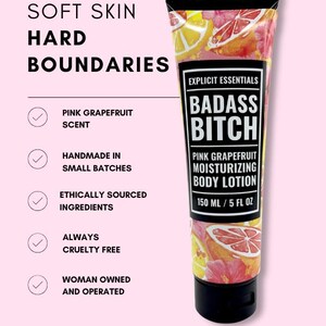May include: A 5 fl oz tube of pink grapefruit scented body lotion with a black cap. The label features the text Explicit Essentials, Badass Bitch, and Pink Grapefruit Moisturizing Body Lotion. The tube has a watercolor print of grapefruit slices.