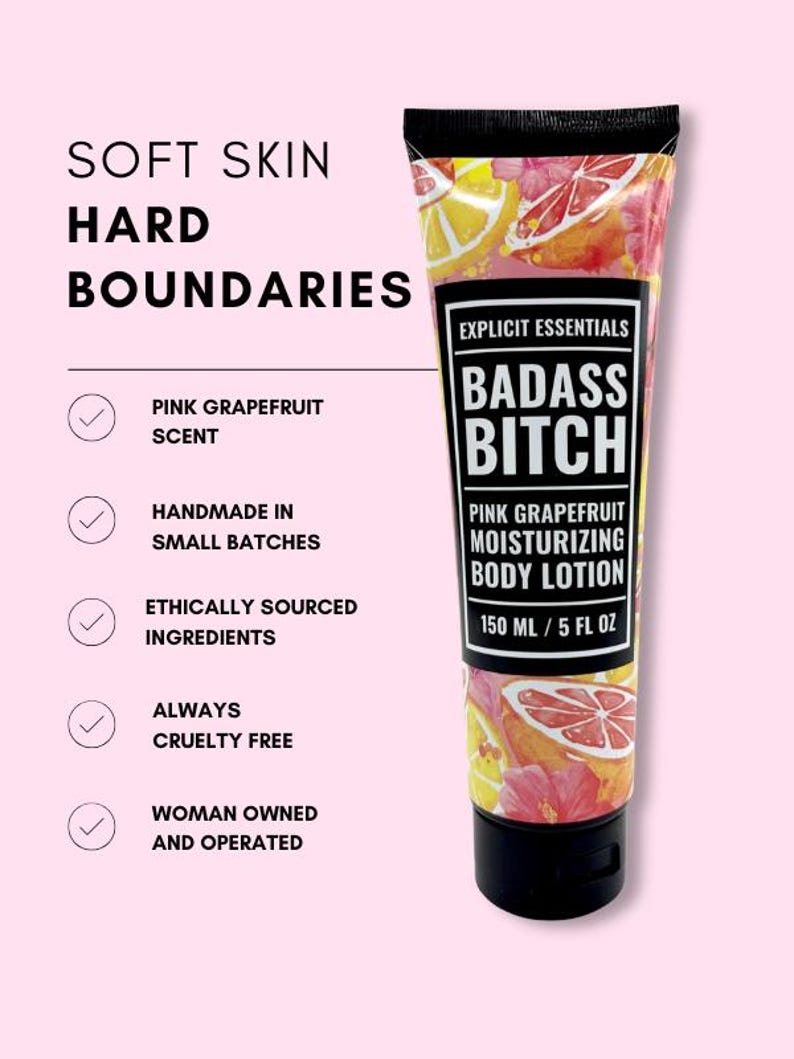 May include: A 5 fl oz tube of pink grapefruit scented body lotion with a black cap. The label features the text Explicit Essentials, Badass Bitch, and Pink Grapefruit Moisturizing Body Lotion. The tube has a watercolor print of grapefruit slices.
