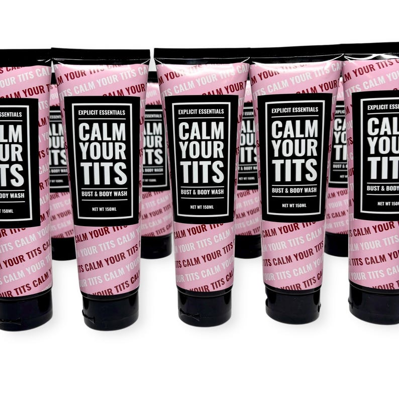 May include: Multiple tubes of bust and body wash are displayed. Each tube is black with a pink label. The label reads "CALM YOUR TITS" in large white letters. The product is from "Explicit Essentials" and is 150ml.