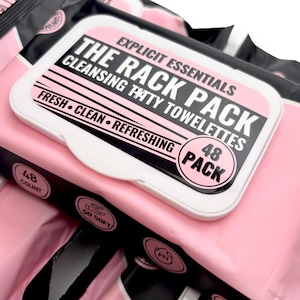 May include: A package of pink cleansing towelettes with the text "THE RACK PACK" in black and white. The package also includes the words "FRESH, CLEAN, REFRESHING" and "48 PACK".