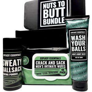 May include: A black gift set labelled "Nuts to Butt Bundle" containing Explicit Essentials products. Includes "Sweaty Ballsack" chafing powder, "Crack and Sack" intimate wipes, and "Wash Your Balls" body wash. The products are in black and green packaging.