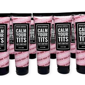 May include: Multiple tubes of bust and body wash are displayed. The tubes are pink with black text that reads "CALM YOUR TITS" in large letters. The product is labeled "Explicit Essentials" and the net weight is 150ml.