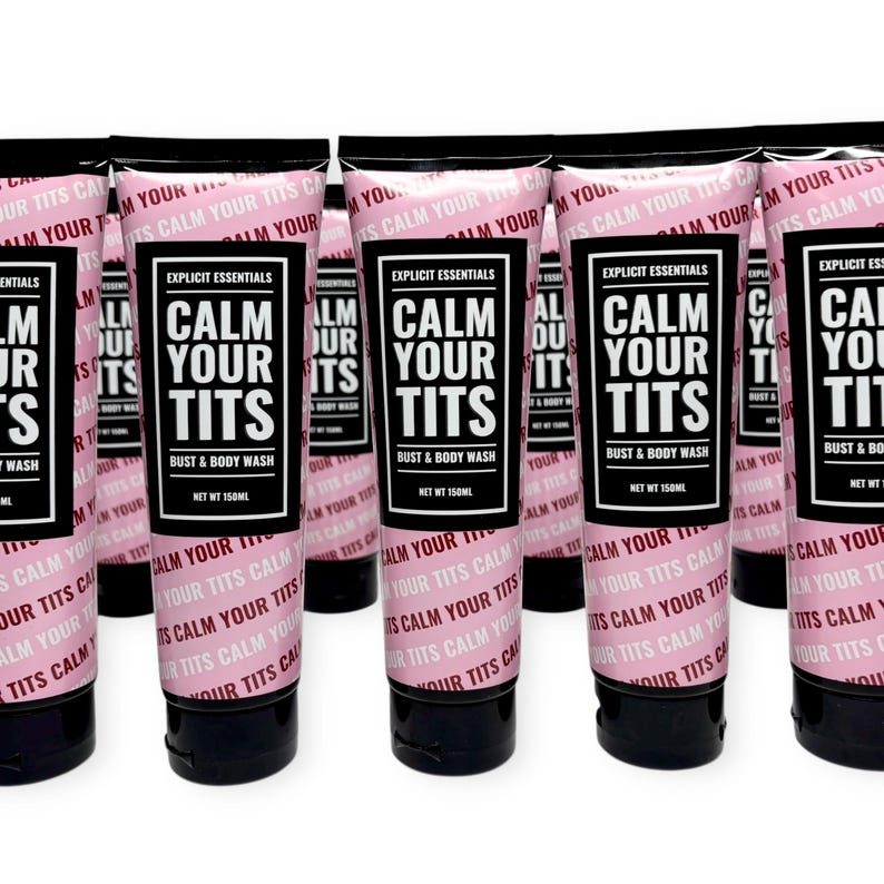 May include: Multiple tubes of bust and body wash are displayed. The tubes are pink with black text that reads "CALM YOUR TITS" in large letters. The product is labeled "Explicit Essentials" and the net weight is 150ml.