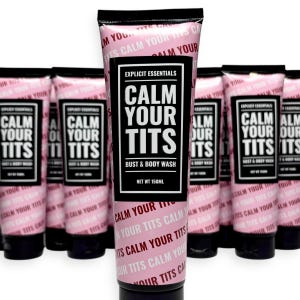 May include: Pink squeeze tubes of "Calm Your Tits" bust and body wash. The tubes have black caps and a black and white label with the product name. The text "Explicit Essentials" is also on the label. Net weight is 150ml.