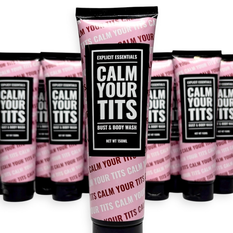 May include: Pink squeeze tubes of "Calm Your Tits" bust and body wash. The tubes have black caps and a black and white label with the product name. The text "Explicit Essentials" is also on the label. Net weight is 150ml.