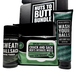 May include: A black and green bundle of Explicit Essentials products. Includes a tube of body wash, a container of chafing powder, and a pack of intimate wipes. The text "Nuts to Butt Bundle" is visible on the box.