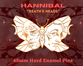 Broche Hannibal « Têtes de mort » en émail dur