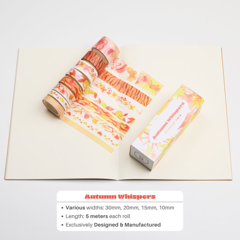 May include: A set of eight washi tapes featuring autumnal designs, including leaves, flowers, and stripes. The tapes are in shades of orange, yellow, and red. The tapes are 5 metres long and come in various widths: 30mm, 20mm, 15mm, and 10mm. The tapes are packaged in a box with the text "Autumn Whispers" and "Occasional Mette".