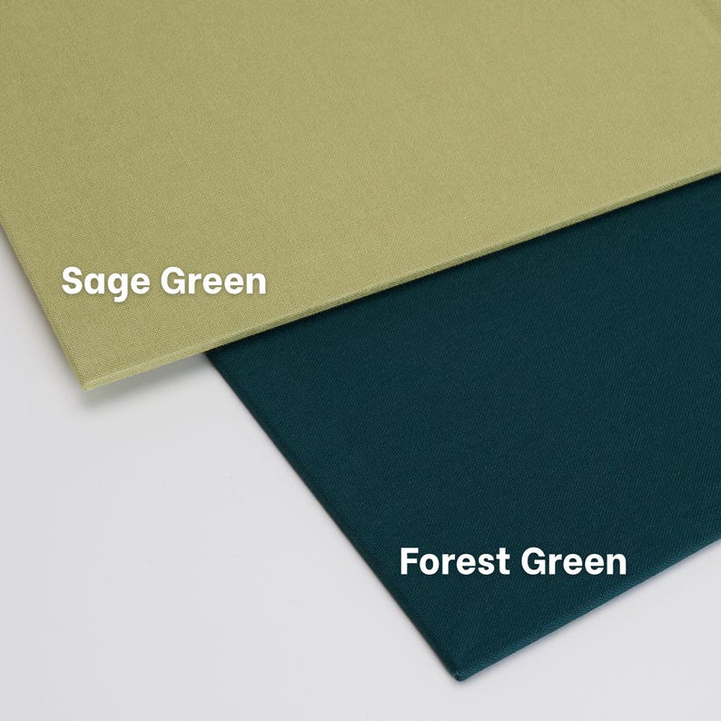 May include: Two rectangular fabric swatches are displayed, one in sage green and one in forest green. The text "Sage Green" is printed on the lighter fabric, and the text "Forest Green" is printed on the darker, deep green fabric swatch.