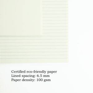 May include: Close-up of a sheet of white, lined paper. The paper is certified eco-friendly, has a line spacing of 6.5 mm, and a density of 100 gsm.