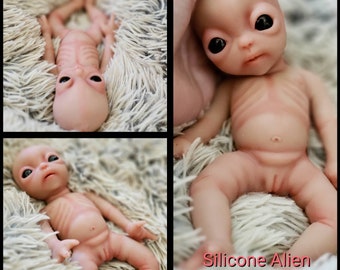 realistic alien doll