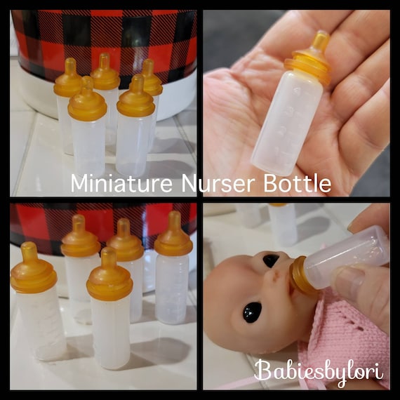 Muñecas con chupete outlet y biberon