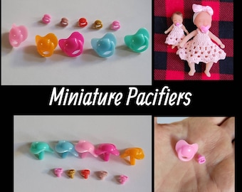 New Miniature Pacifiers Two Sizes. Doll Not Included (Sold Seperatly)