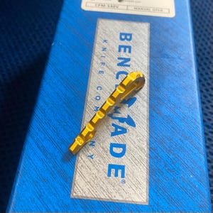 Fits Benchmade Bugout 535 Ribbed Backspacer / TITANIUM Anodized GOLD / Benchmade Bugout 535 - 1x Backspacer • Benchmade Upgrade Parts