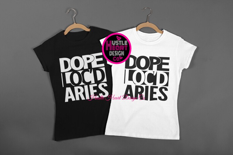 May include: Two t-shirts, one black and one white, with the text "Dope Loc'd Aries" printed in white on the black shirt and black on the white shirt.