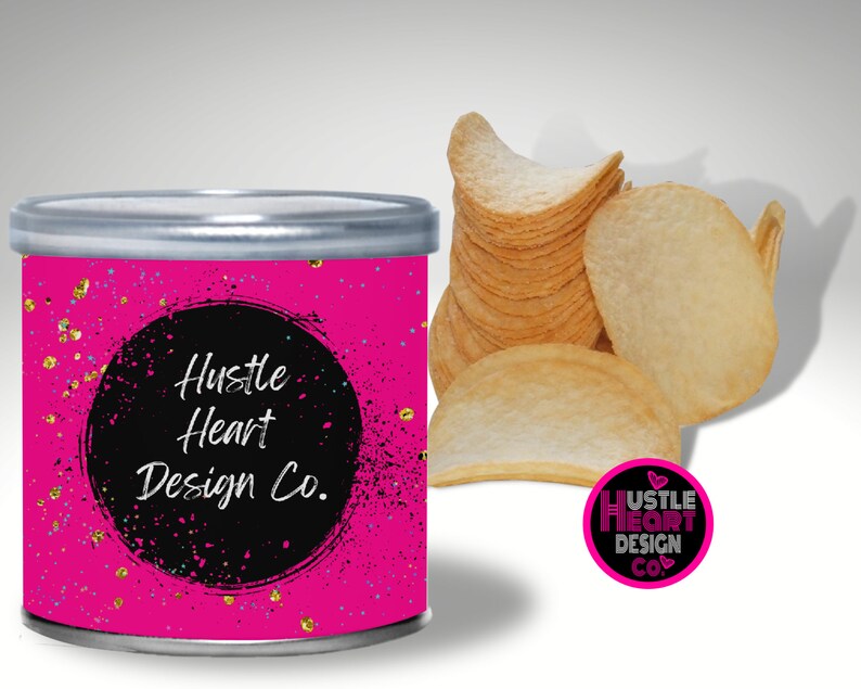 May include: A pink can with a black circle and white text that reads "Hustle Heart Design Co." The can has a gold glitter pattern. The can is sitting on a white surface.