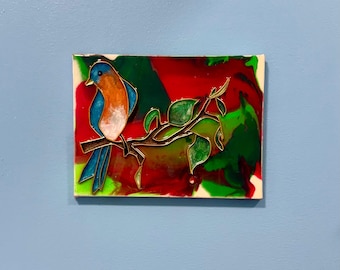 Pájaro azul y naranja sobre fondo rojo y verde en lienzo (5x7 pulgadas)