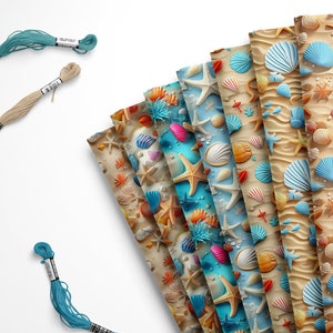 May include: A collection of patterned papers featuring beach and ocean themes, including seashells, starfish, and sand. Three spools of embroidery floss in teal and tan are also present. The papers display various shades of blue, tan, and orange.