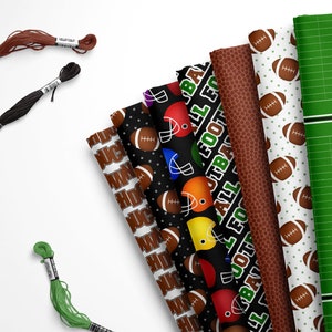 May include: A set of eight different fabric prints featuring football-themed designs. The prints include footballs, helmets, and the words "Football" and "Touchdown".