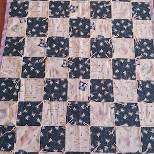 Girl&#39;s Hand Tied Crib Quilt