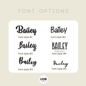 May include: A graphic showcasing six different font options for the name "Bailey." The fonts vary in style, from elegant cursive to bold block letters. The text "FONT OPTIONS" is at the top. The UDB logo is at the bottom.