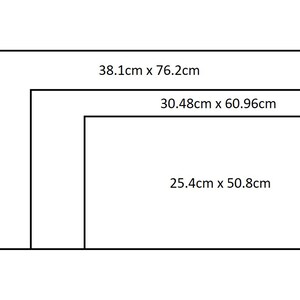 May include: Three nested rectangles with dimensions labeled in centimeters. The largest rectangle measures 15 inches by 30 inches. The middle rectangle is 12 inches by 24 inches. The smallest rectangle is 10 inches by 20 inches.