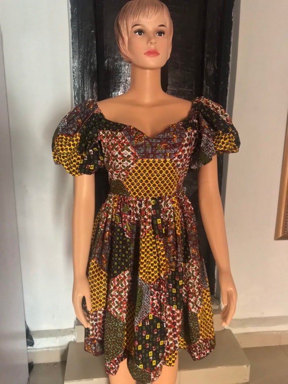 african print dungaree dress