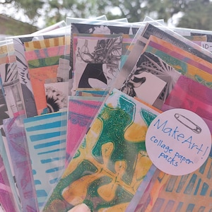May include: A collection of collage paper packs in various colors and patterns, including blue, pink, yellow, and green. The packs are sealed in clear plastic and held together with a round sticker that says "Make Art! collage paper packs".