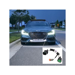 May include: A teal-colored car with bright white headlights and a lower LED light bar. A close-up shows a wiring harness with connectors, including a black one and a green one, likely for the car's lighting system.