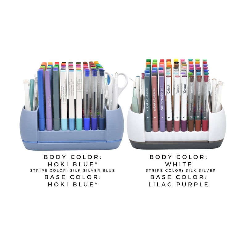 May include: Two Cricut pen organizers, one in light blue and one in white, each holding multiple pens and markers.  The light blue organizer has a silk silver blue stripe and a light blue base. The white organizer has a silk silver stripe and a lilac purple base. Both organizers feature multiple compartments for storing various writing tools.  The text on the image indicates the body and base colors of each organizer.
