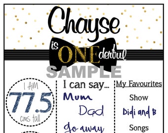 May include: A black and gold bow tie with the words "Chayse is ONE derful" printed on it. The poster also includes a list of milestones for a one-year-old, such as height, weight, and favorite things.