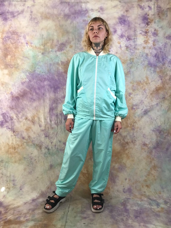 turquoise tracksuit