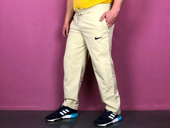 nike beige track pants