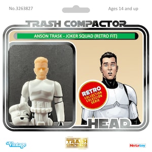 May include: A retro-style action figure package featuring a white and black action figure and a comic-style illustration of a man in a white uniform. The package includes the text "ANSON TRASK - JOKER SQUAD (RETRO FIT)" and "RETRO COLLECTION SERIE".