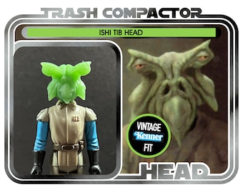 May include: Vintage action figure of an Ishi Tib Head, part of the Trash Compactor series. The figure features a green head and a tan and blue uniform. The packaging includes the text "Vintage Kenner Fit."