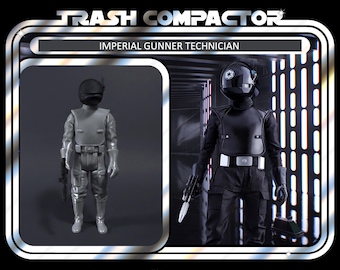 May include: Vintage "Trash Compactor" action figure package featuring an Imperial Gunner Technician. The package includes two figures, one in gray and one in black, with the text "Ages 14 and up" and "Notatoy".